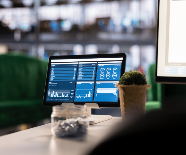 executive-workspace-features-digital-dashboard-with-financial-charts 1